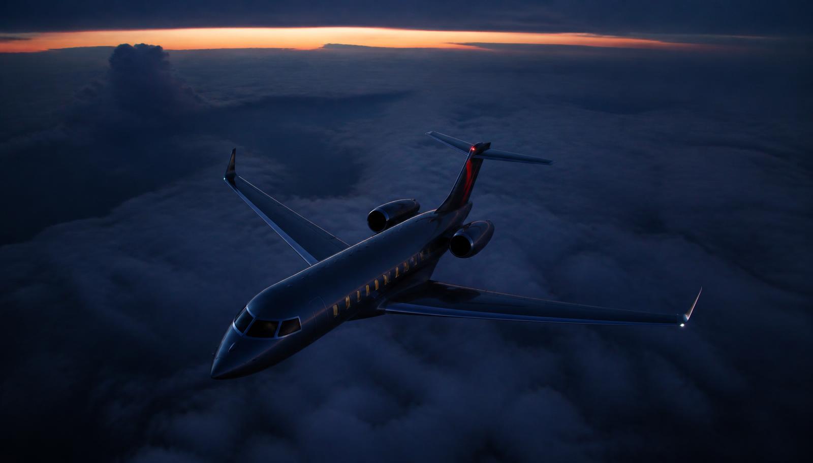 Private jet above the clouds at dusk
